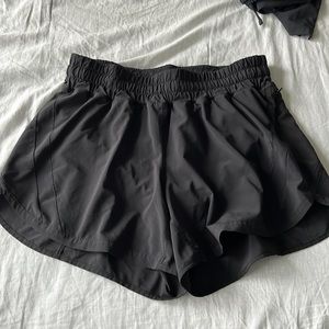 Lululemon track that 5in. Fully lined, size 10 and color is black